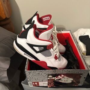 Air Jordan 4 Retro White, black and Red Sneakers